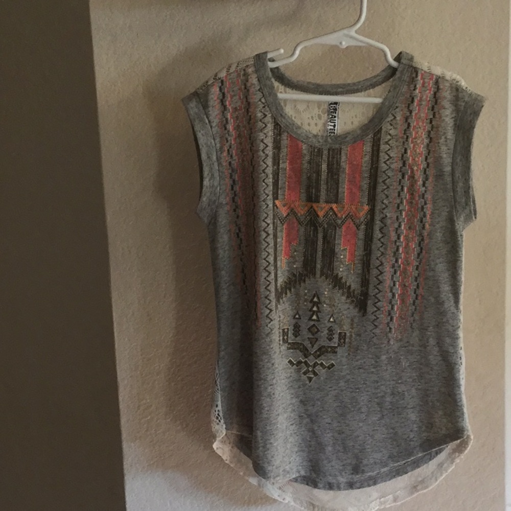 Girls size medium aztec short sleeved shirt